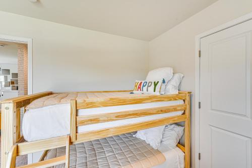 a bedroom with two bunk beds in a room at Modern Anderson Home with Fire Pit and Grill in Anderson