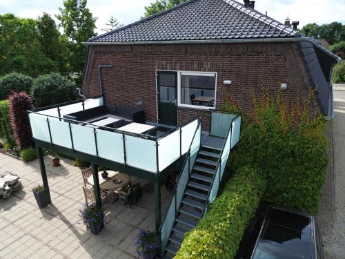 an elevated view of a house with a balcony at Appartement Siebengewald in Siebengewald