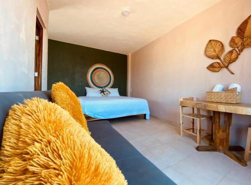 Postel nebo postele na pokoji v ubytování Hotel Mulata