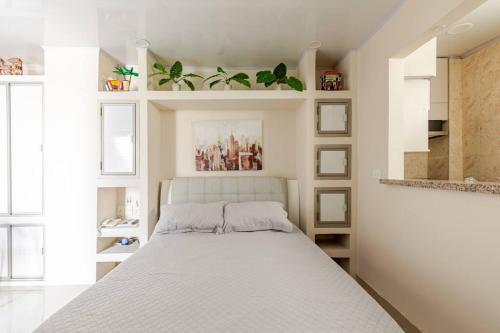 En eller flere senge i et værelse på Studio at the Resort Residence 2