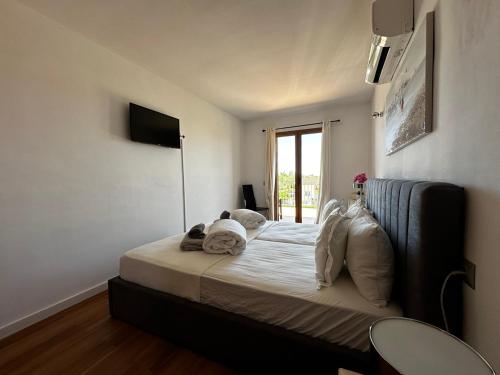 Postel nebo postele na pokoji v ubytování Casa El Verano - Traumhaus am Es Trenc