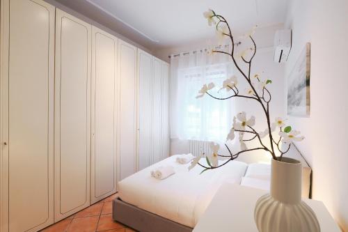 Postel nebo postele na pokoji v ubytování PrimoPiano - Promessi Sposi