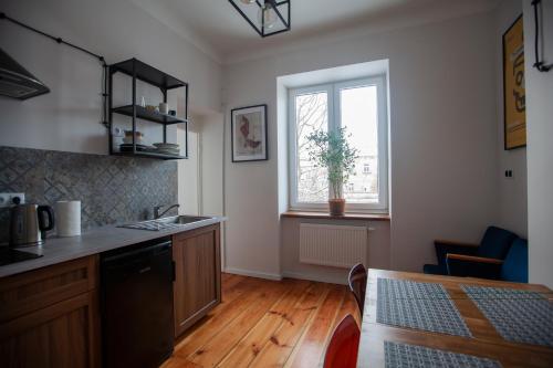 Η κουζίνα ή μικρή κουζίνα στο Centrum 51 Apartamenty