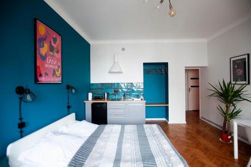 Ένα ή περισσότερα κρεβάτια σε δωμάτιο στο Centrum 51 Apartamenty