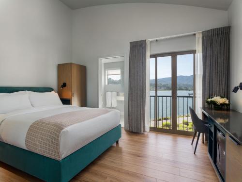 Postel nebo postele na pokoji v ubytování Acqua Hotel