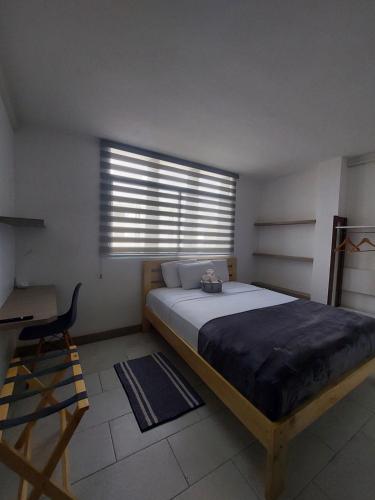 Postel nebo postele na pokoji v ubytování Libertad 109 Hotel