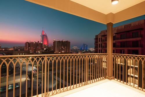 a view of a city skyline from a balcony at Spectacular 2BR Apartment Full BurjAlArab View in Dubai