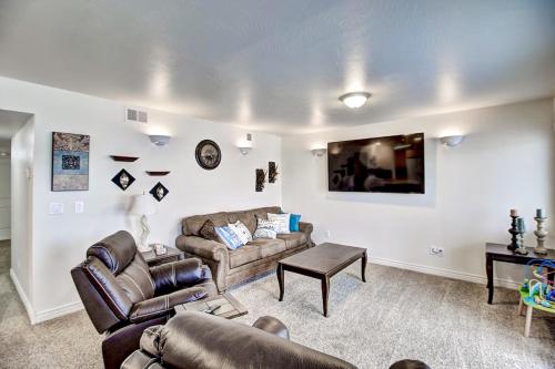 a living room with two couches and a table at Montana Memory Maker in Polson