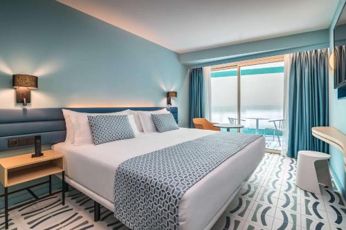 Un ou plusieurs lits dans un hébergement de l'établissement Barceló Benidorm Beach - Adults Recommended