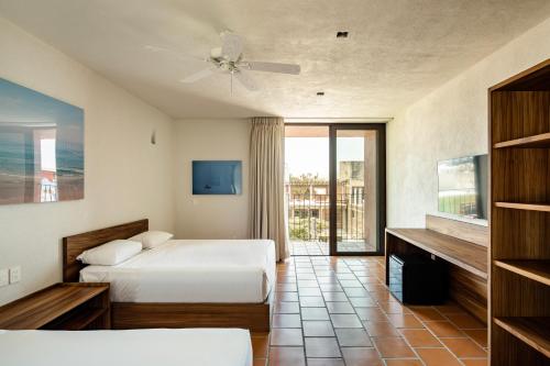 Postel nebo postele na pokoji v ubytování HOTEL AURELIA