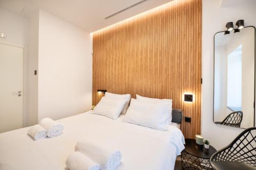 Katil atau katil-katil dalam bilik di Cardamilia Suites