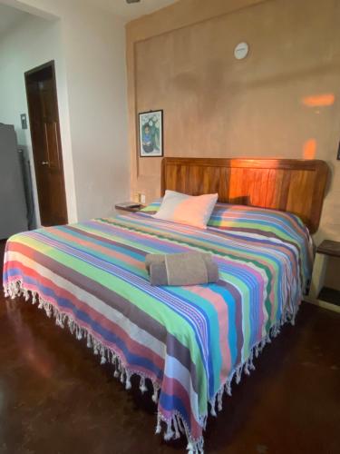 Cama o camas de una habitación en Cielito Lindo Suites