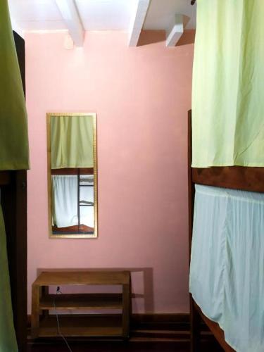 Ένα ή περισσότερα κρεβάτια σε δωμάτιο στο É Hostel