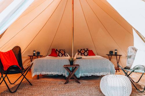 Ένα ή περισσότερα κρεβάτια σε δωμάτιο στο Yellowstone Glamping