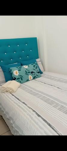 Postel nebo postele na pokoji v ubytování Summer Sands Scottburgh
