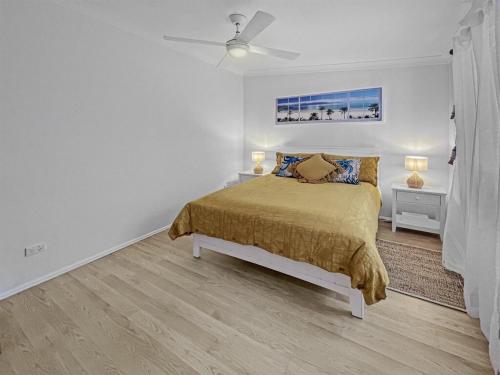 Ένα ή περισσότερα κρεβάτια σε δωμάτιο στο Oasis Coastal Stay