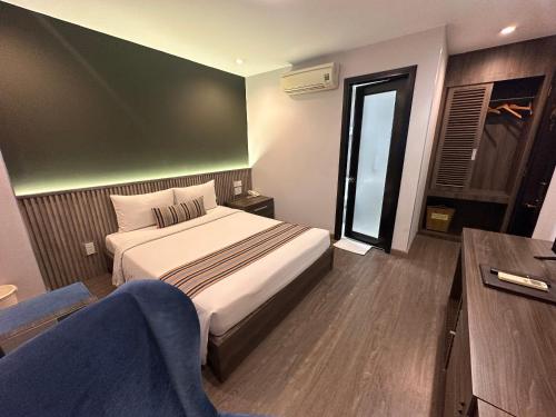 Cama o camas de una habitación en Iris Hotel
