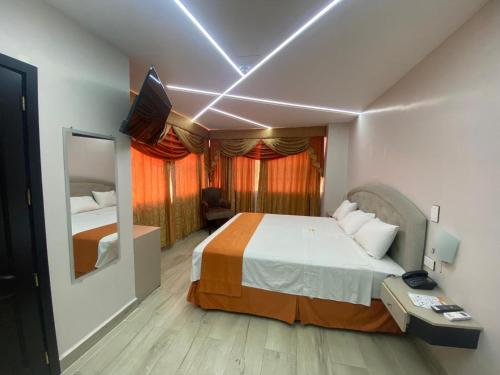 Cama o camas de una habitación en BRITNEY HOTEL Machala