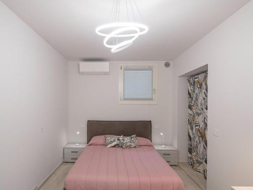 Postel nebo postele na pokoji v ubytování Spacious Stay in Montelupone