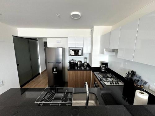 Dapur atau dapur kecil di Luxury apartment with sky & ocean view