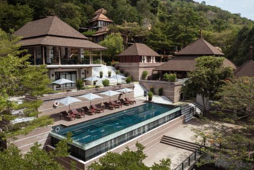 an aerial view of a mansion with a swimming pool at Villa Zolitude Resort & Spa - SHA Extra Plus in Chalong 