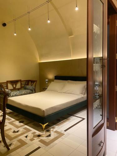 a bedroom with a bed in a room at La dimora di Don Antonio in Matera