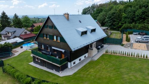 an aerial view of a house with a roof at Chata Markétka in Dobré