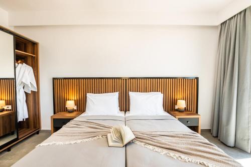Кровать или кровати в номере Apolis Beachscape Hotel