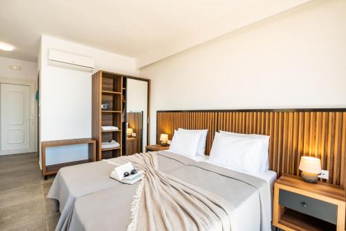 Кровать или кровати в номере Apolis Beachscape Hotel
