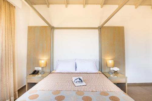Кровать или кровати в номере Apolis Beachscape Hotel