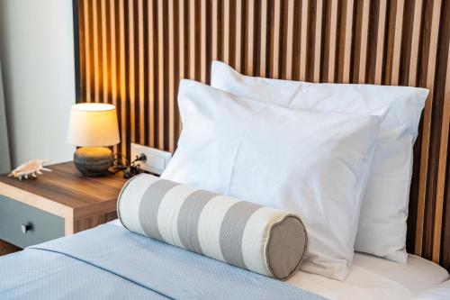 Кровать или кровати в номере Apolis Beachscape Hotel