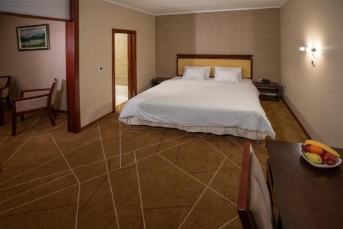 Postel nebo postele na pokoji v ubytování Hotel Aquastar Danube