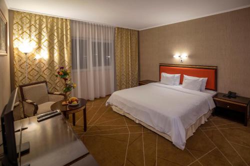 Postel nebo postele na pokoji v ubytování Hotel Aquastar Danube