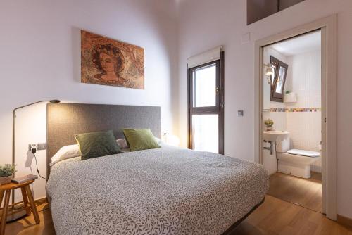 Ένα ή περισσότερα κρεβάτια σε δωμάτιο στο Iconic by Unik Vacation