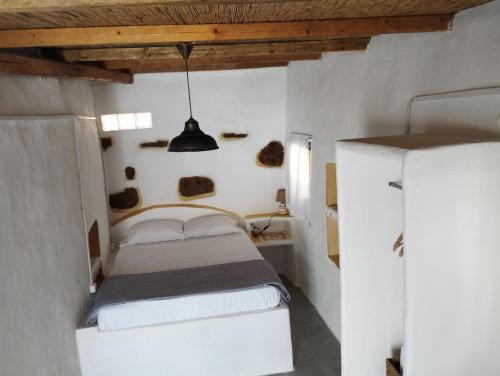 Postel nebo postele na pokoji v ubytování Venduri House