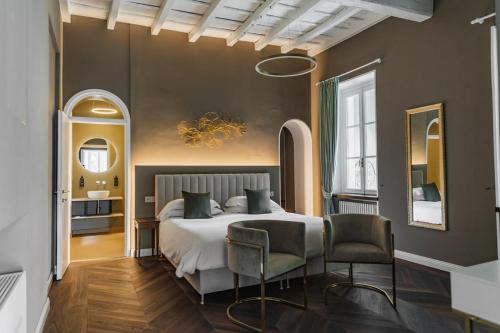 Postel nebo postele na pokoji v ubytování Villa Antica Colonia SPA & Wellness