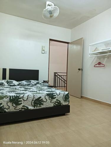 Katil atau katil-katil dalam bilik di SAFIYYAH HOMESTAY