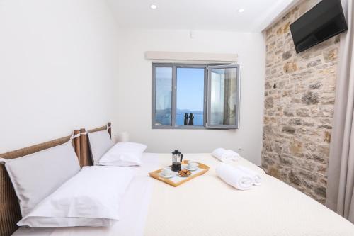 Ένα ή περισσότερα κρεβάτια σε δωμάτιο στο Villa Wood&Stone