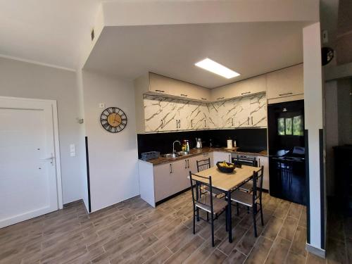 Kuchyň nebo kuchyňský kout v ubytování Arianas apartment