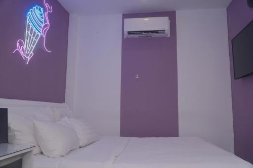 Katil atau katil-katil dalam bilik di Galaxy Hotel