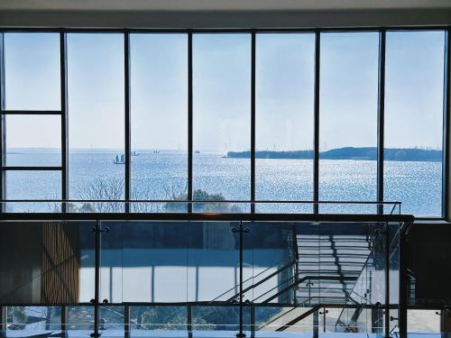 an empty building with a view of the water at Le Meridien Suzhou, Suzhou Bay in Suzhou