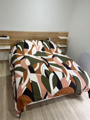 Postel nebo postele na pokoji v ubytování La maison des hôtes