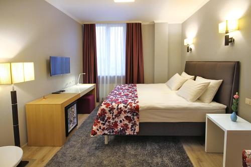 Voodi või voodid majutusasutuse City Park Hotel toas