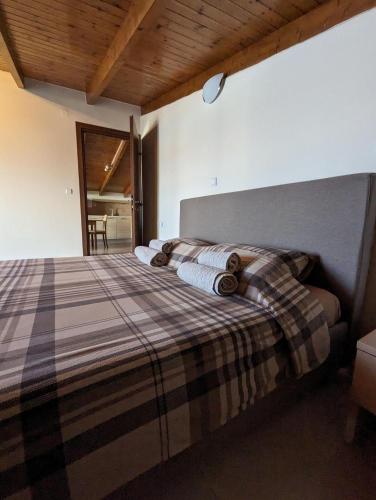 Ένα ή περισσότερα κρεβάτια σε δωμάτιο στο Samaras Apartments in Kamena Vourla