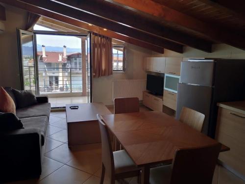 Μια τηλεόραση ή/και κέντρο ψυχαγωγίας στο Samaras Apartments in Kamena Vourla