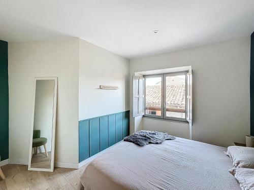 Ένα ή περισσότερα κρεβάτια σε δωμάτιο στο 2 chambres Évasion Ardéchoise