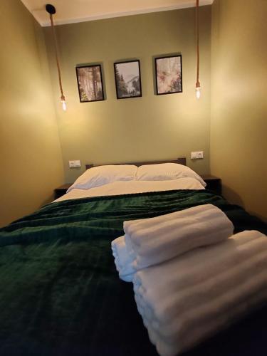 Ein Bett oder Betten in einem Zimmer der Unterkunft Apartament Mała Twierdza