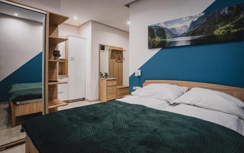 Postel nebo postele na pokoji v ubytování Gál Apartman Szeged -Keco-