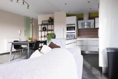 Kuchyň nebo kuchyňský kout v ubytování Comfortabel vakantie appartement aan zee - De Zandloper