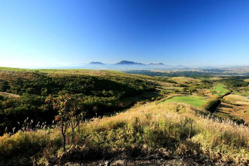 a view from the top of a hill at Spagreenness in Kokonoe